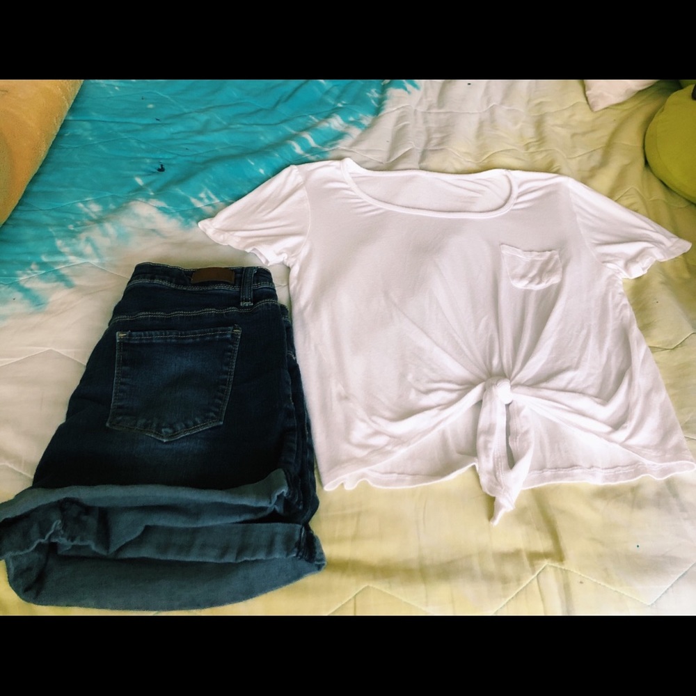 white tee with a tie at the bottom